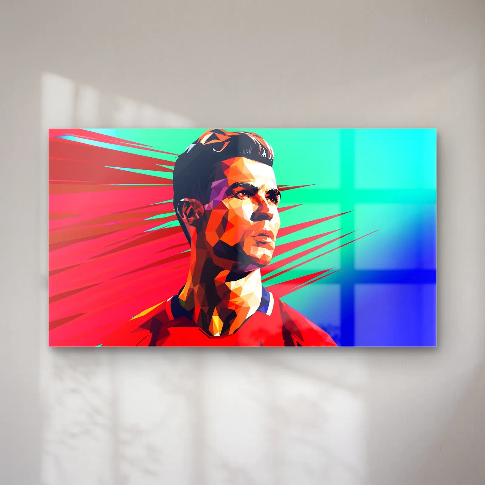 Cristiano Ronaldo Low Poly cam tablo — Kırmızı ve turkuaz arka planda Portekiz formalı Cristiano Ronaldo'nun low-poly portresi