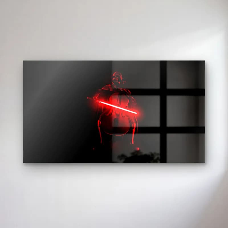 Kırmızı Işın Kılıçlı Darth Vader cam tablo — Siyah arka planda kırmızı ışın kılıcı tutan Darth Vader silueti