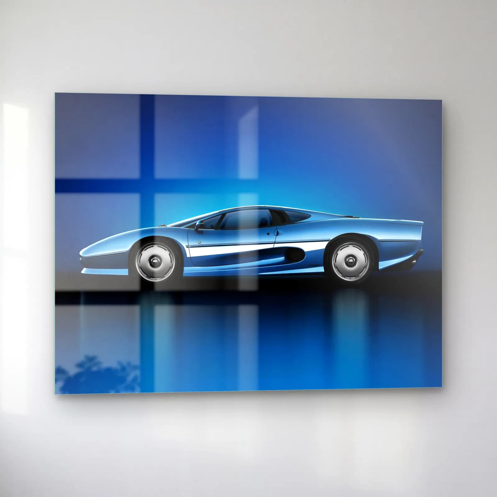 Mavi Jaguar XJ220 cam tablo — sol açıdan görünüm