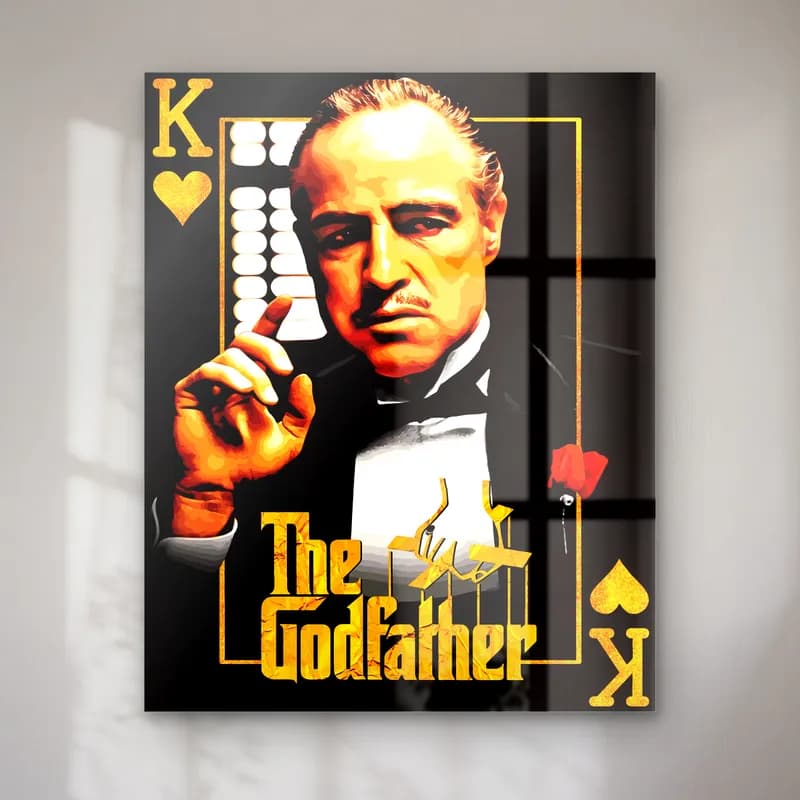 The Godfather Papaz Kartı cam tablo — Papaz iskambil kartı çerçevesinde Vito Corleone ve altın Godfather yazısı